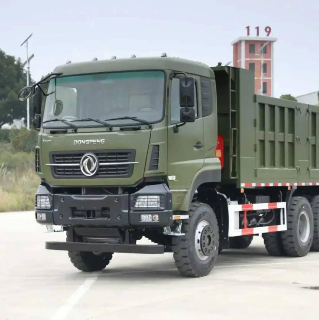 Green cargo dump truck front angle